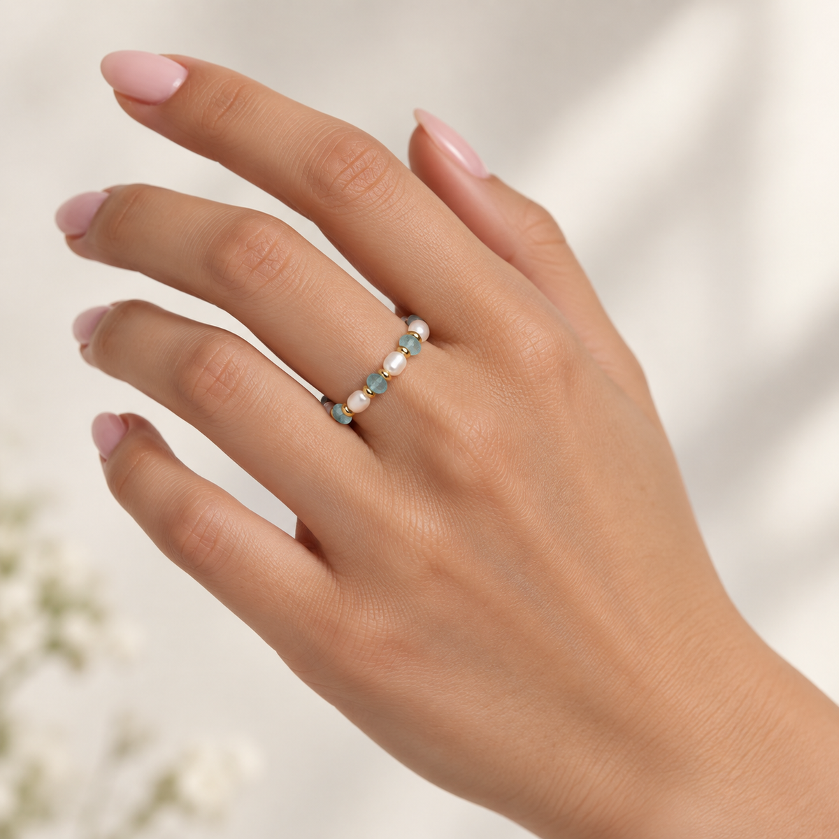 Aqua Pearl Rhythm Ring design worn on hand
