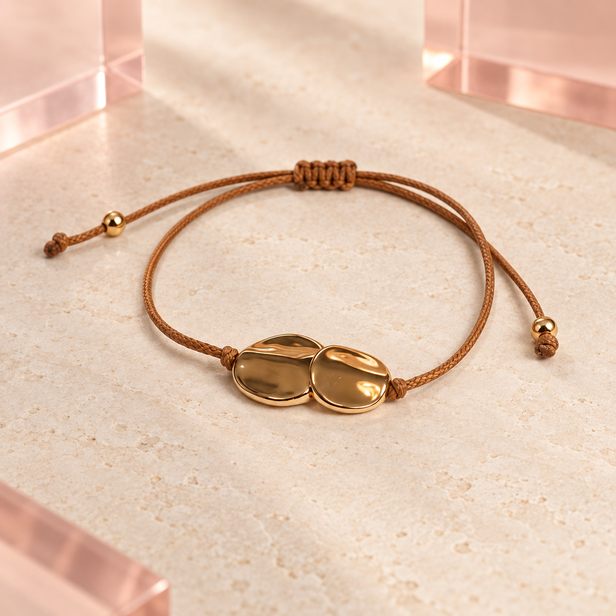 Luna Twin Pebble Cord Bracelet on Bloomy ivory and blush background