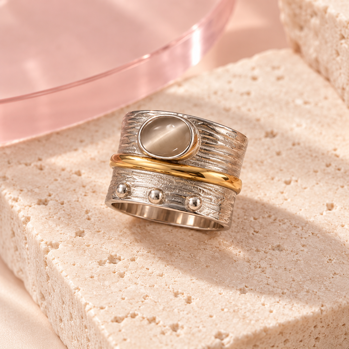 Mixed-metal cat-eye layered statement ring on Bloomy ivory stone