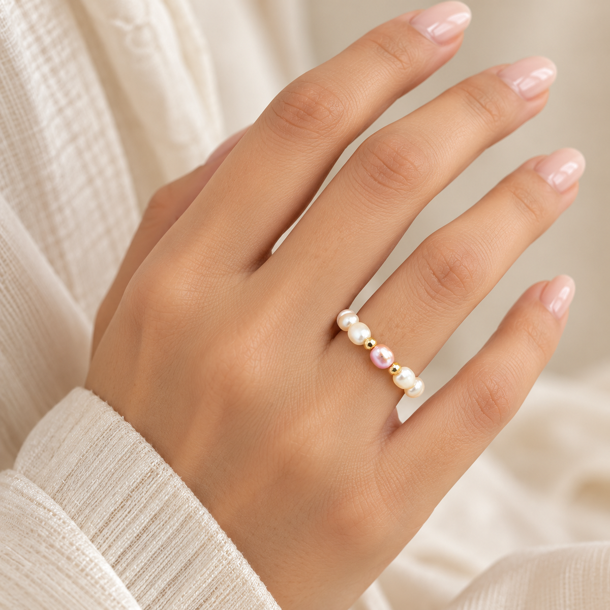 Blush Pearl Accent Ring worn on ring finger