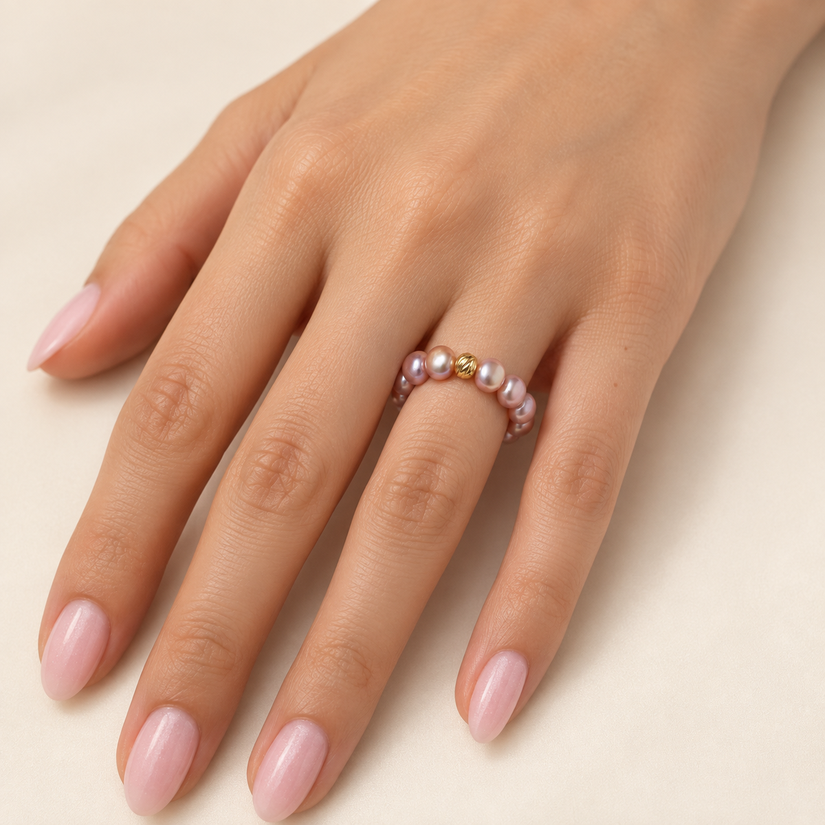 Rosé Baroque Pearl Ring worn on hand