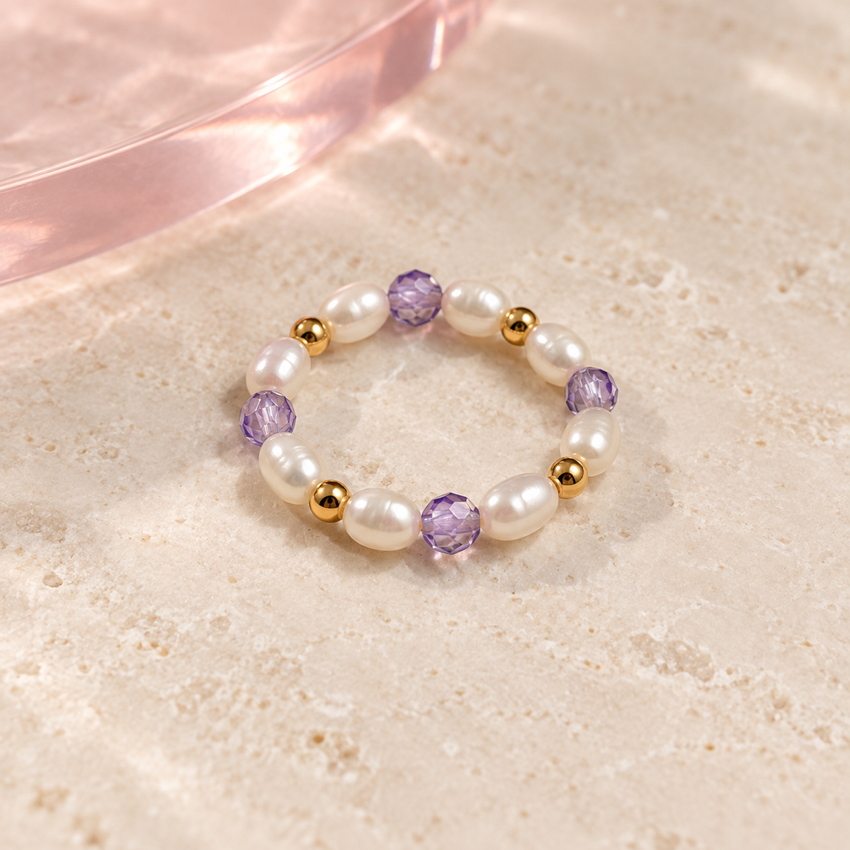 Lavender Glow Pearl Ring by Bloomy on warm ivory stone