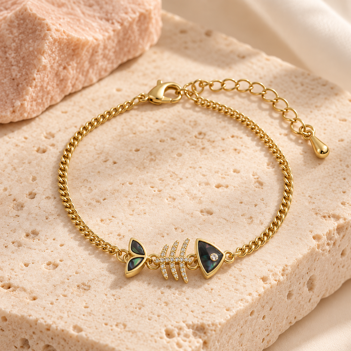 Bloomy Midnight Marina Fishbone Bracelet on cream travertine