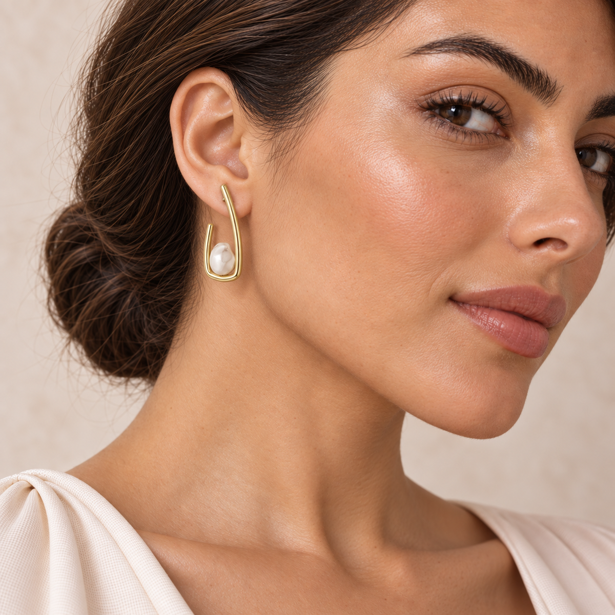 Bloomy model wearing Sculpted Pearl Loop Earrings
