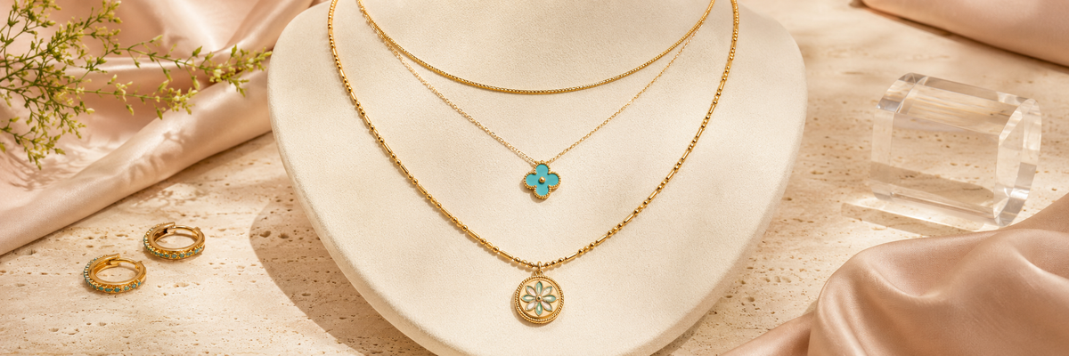 Three layered bloomy necklaces styled at different lengths without tangling