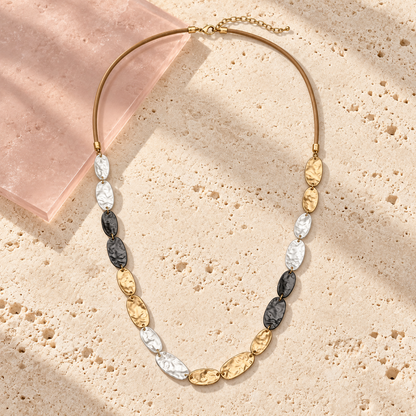 Amara Tri-Tone Long Necklace on ivory travertine