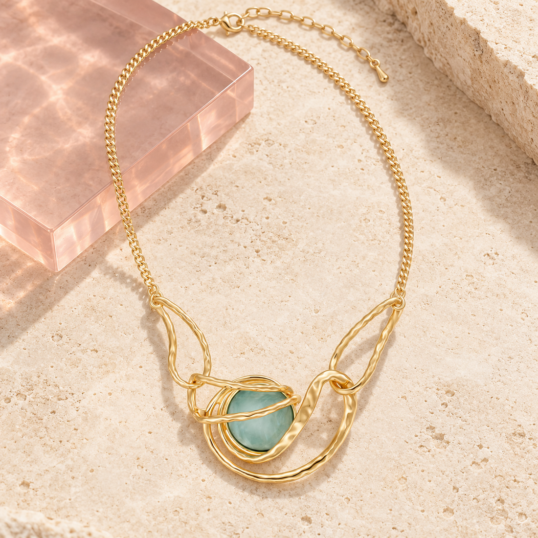 Aurelia Aqua Statement Necklace on ivory stone with blush acrylic
