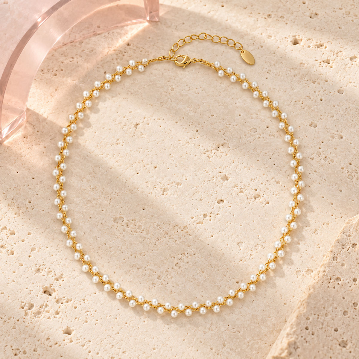 Aurelia Pearl Twist Necklace by Bloomy on ivory stone