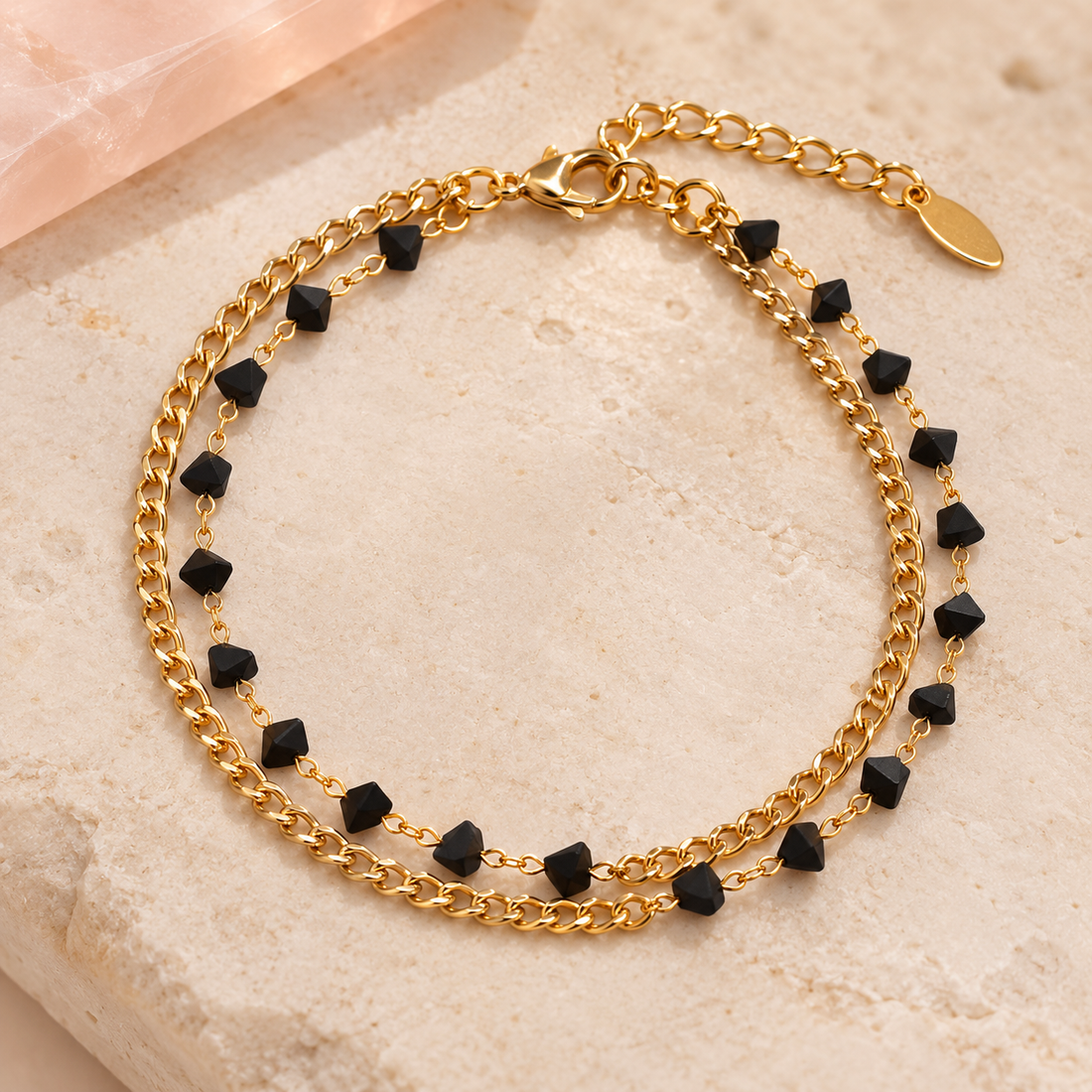 Gold-tone double-layer bracelet with tiny angular black beads