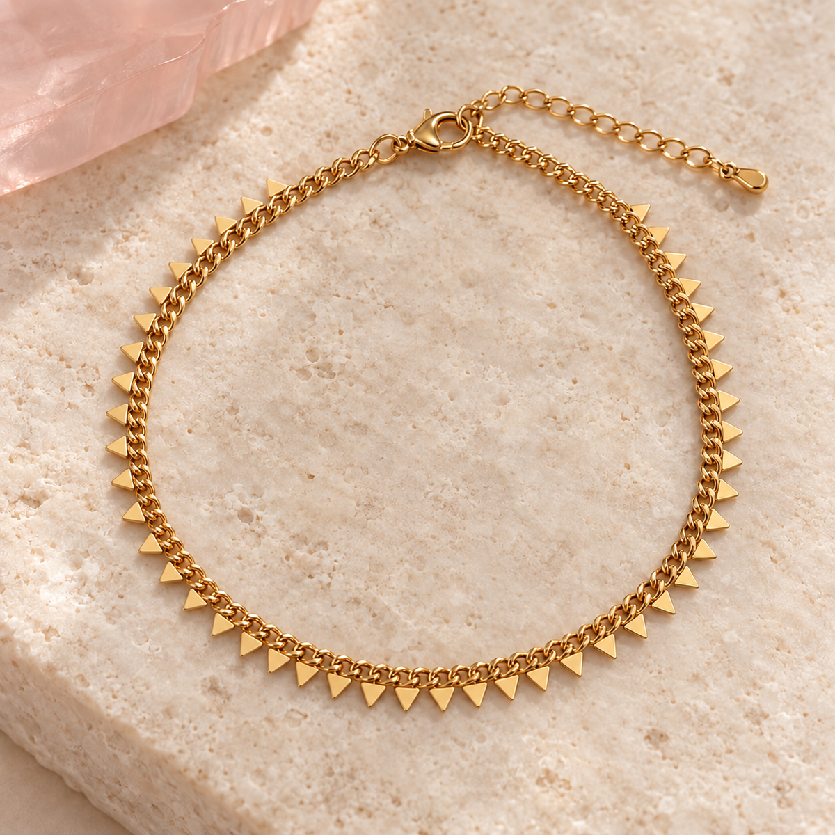Gold triangle charm anklet on ivory stone