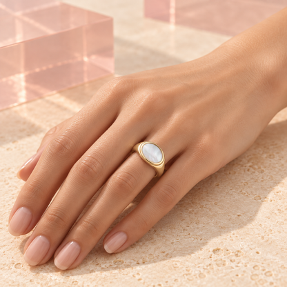 Alba Mother of Pearl Signet Ring in gold worn on a model hand