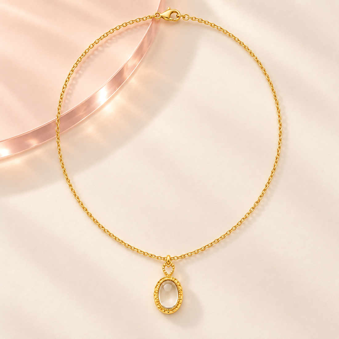 bloomy Aura Veil transparent oval pendant necklace on warm ivory and blush styling