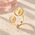 Aurelia Twin Disc Ring in natural light