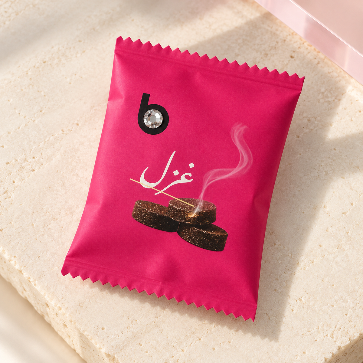 bloomy Bakhour Bonbon Ghazal individually wrapped sachet on ivory stone