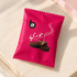 bloomy Bakhour Bonbon Jouri individually wrapped sachet on ivory stone
