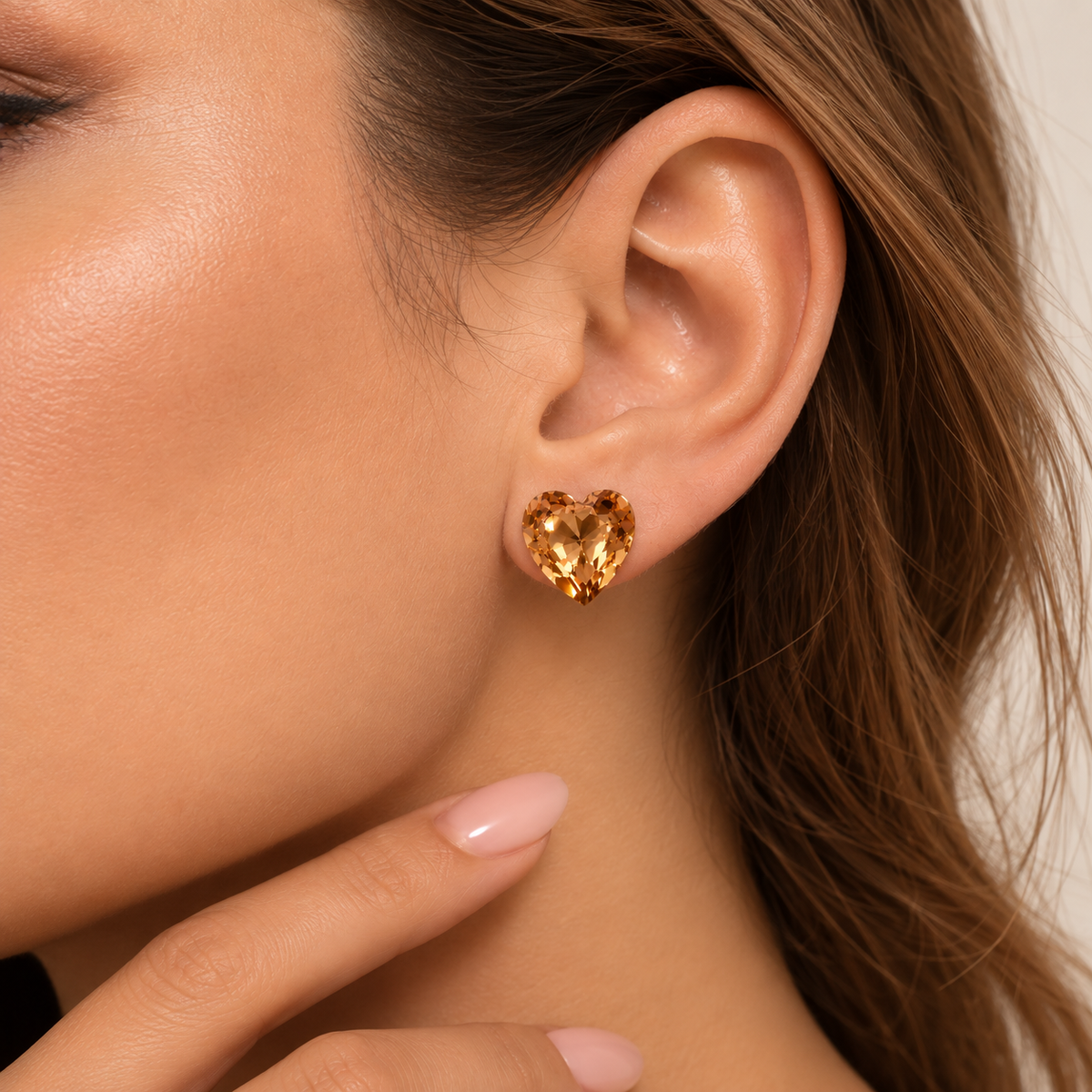 Champagne heart crystal stud earrings worn by Mimi