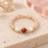 Blush and Burgundy Pearl Beaded Ring solo on ivory stone