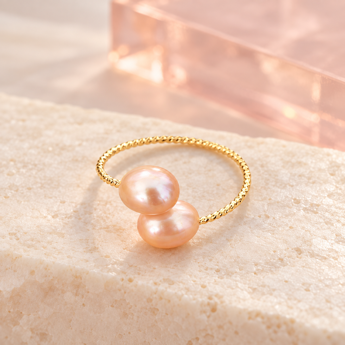 Duo Pearl Twist Ring in Peach, solo on ivory stone