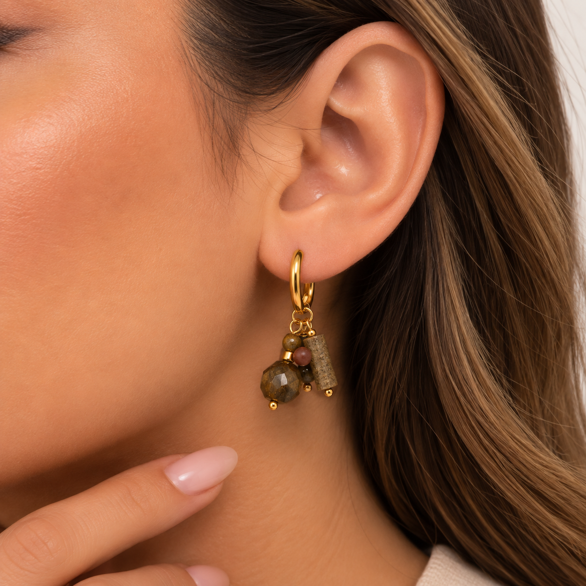 Earthy charm hoop earring worn by Mimi
