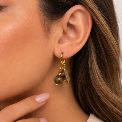 Earthy charm hoop earring worn by Mimi