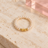 Geometric pearl ring with polished gold triangle accents