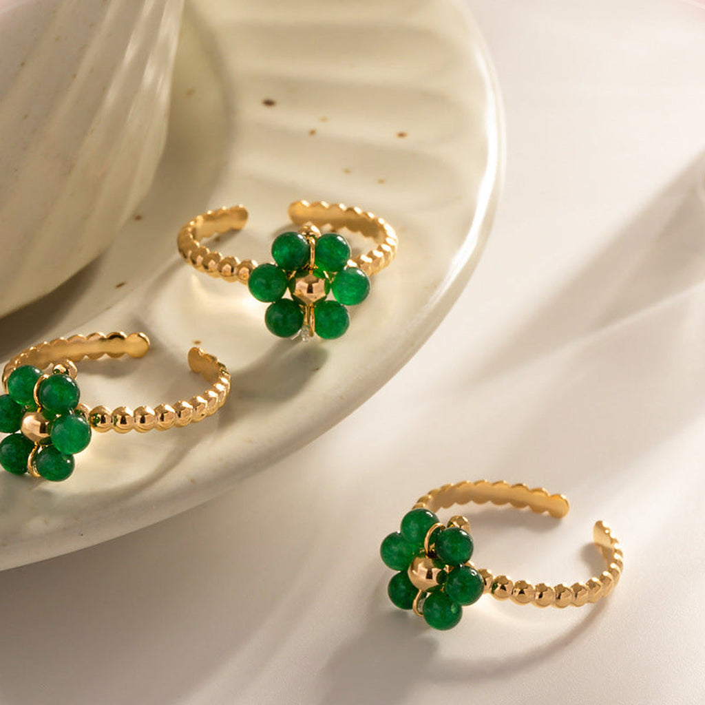 Gold Beaded Ring with Gemstone Flower — detail view