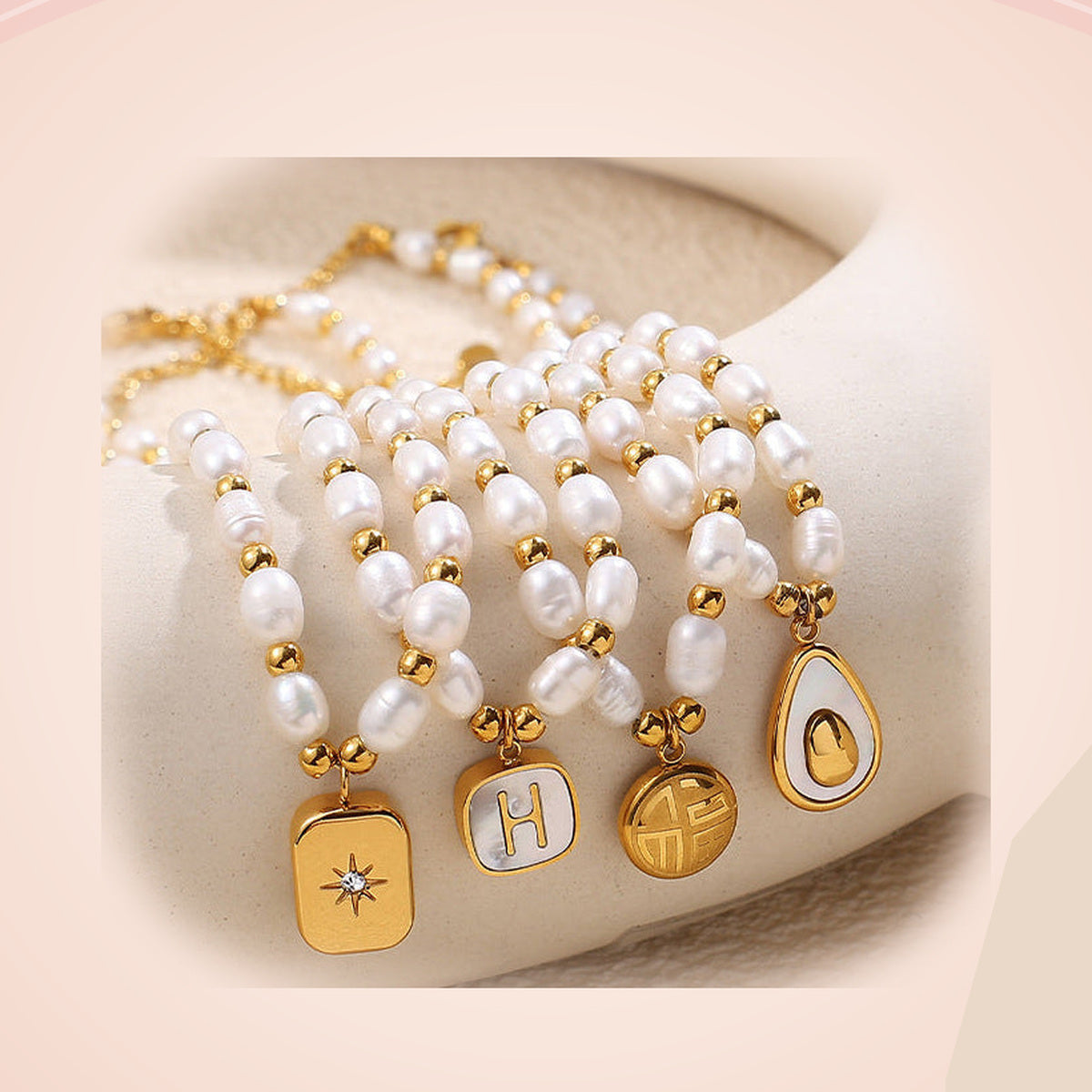 Gold Charm Pearl Necklace — detail view