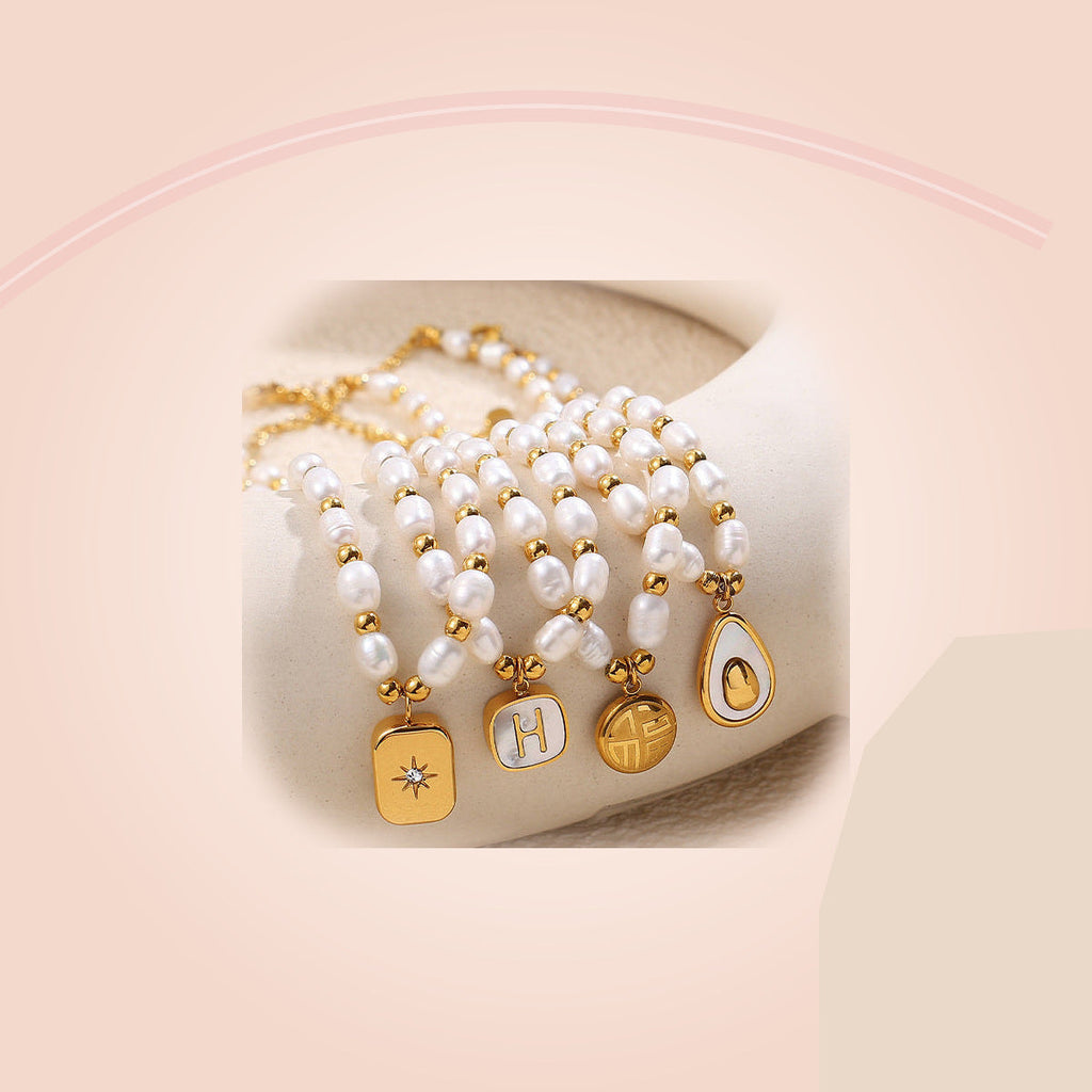 Gold Charm Pearl Necklace — full product view