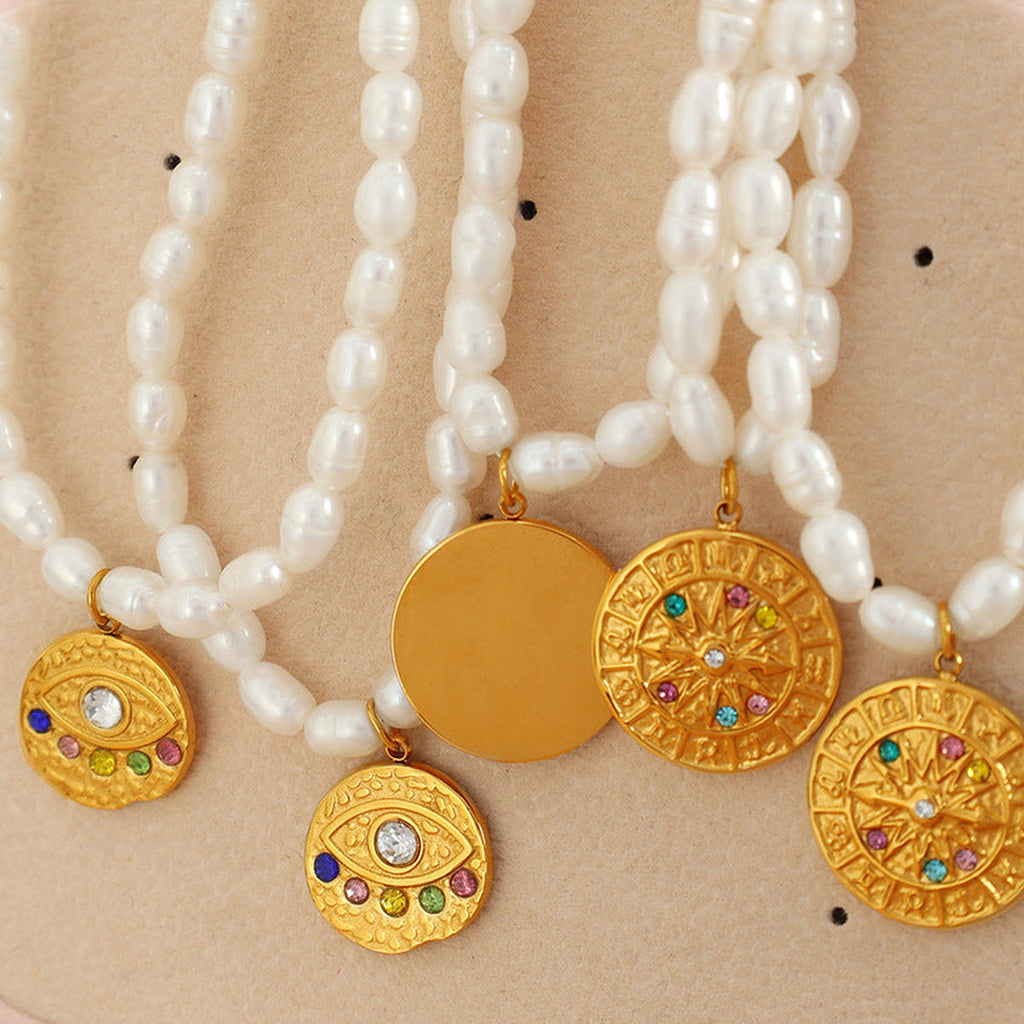 Gold Medallion Pearl Necklace — detail view