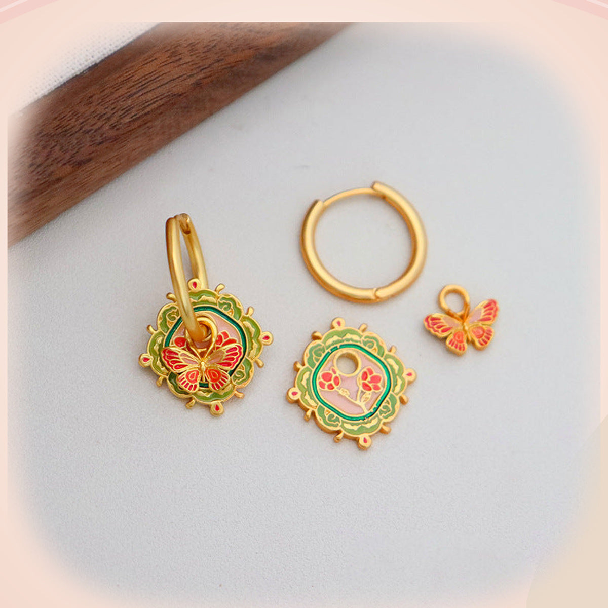 Green & Orange Butterfly Earrings with Gold Frame — detail view