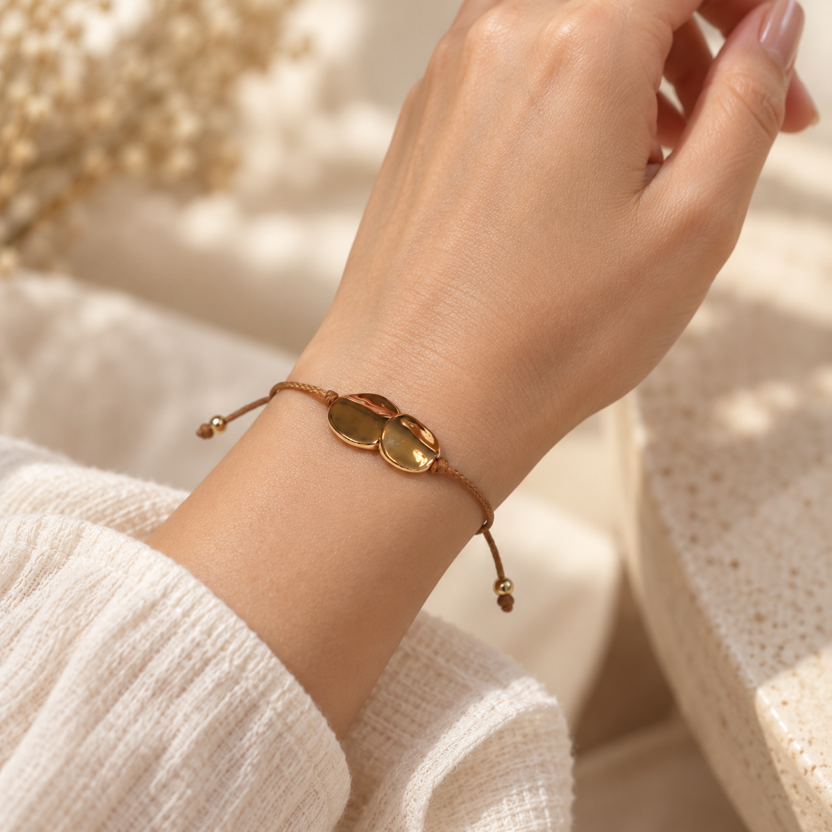 Luna Twin Pebble Cord Bracelet worn on a model wrist