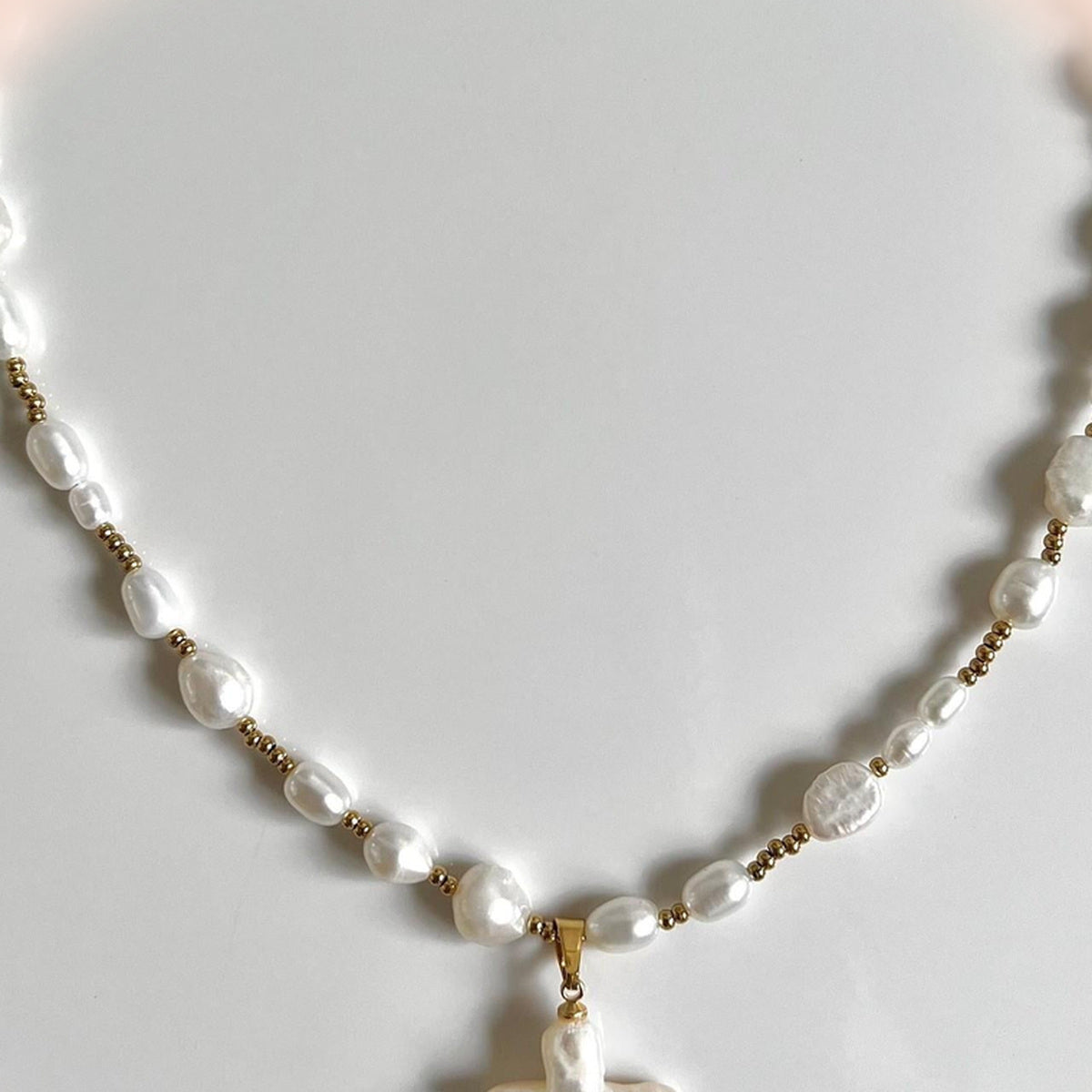 Natural Pearl Cross Necklace — detail view