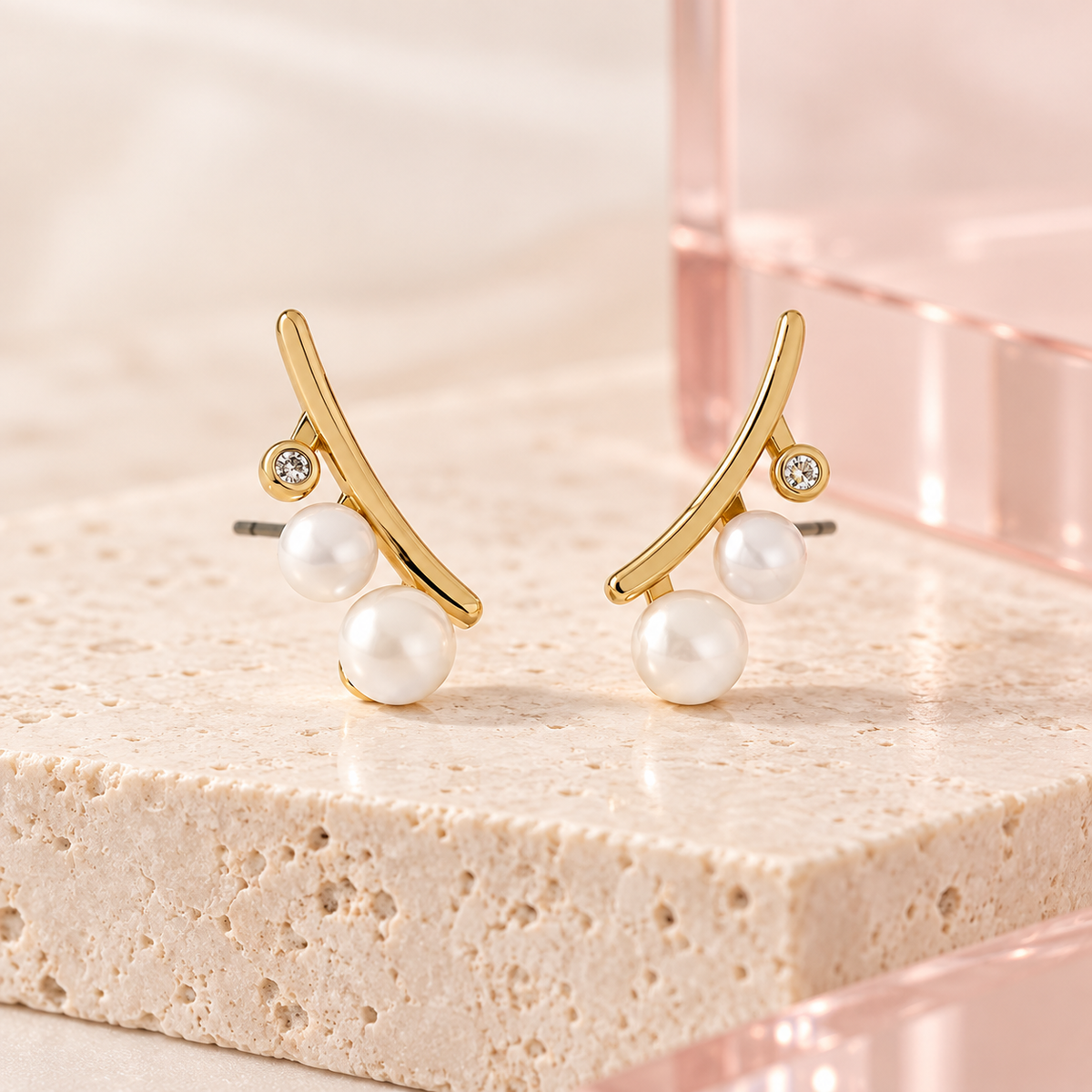 Pearl Arc Climber Earrings on Bloomy travertine display