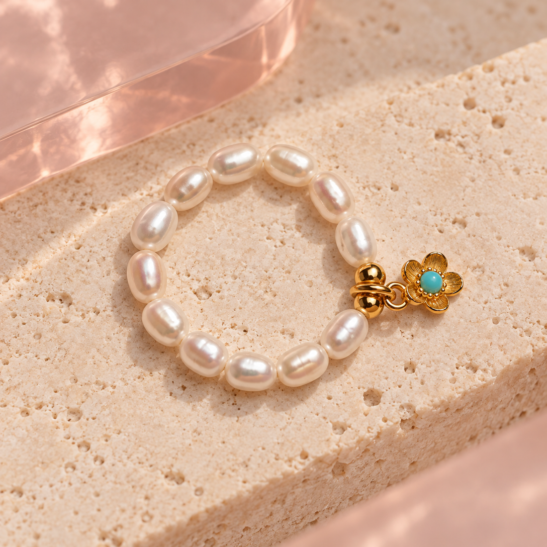 Pearl charm ring with gold flower and turquoise center