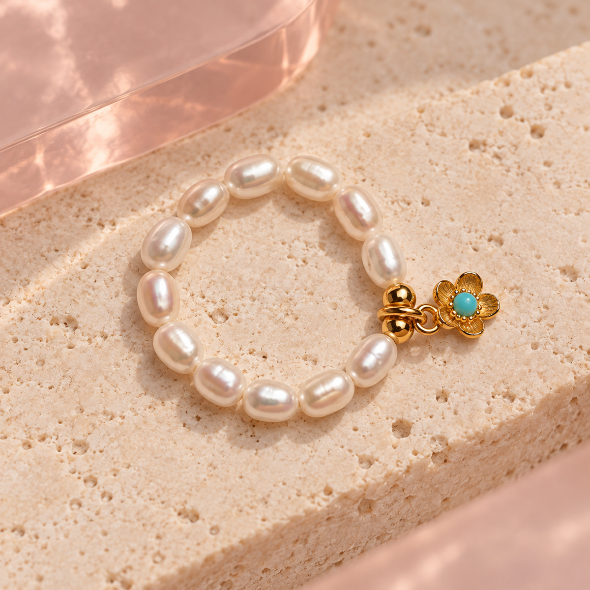 Pearl charm ring with gold flower and turquoise center