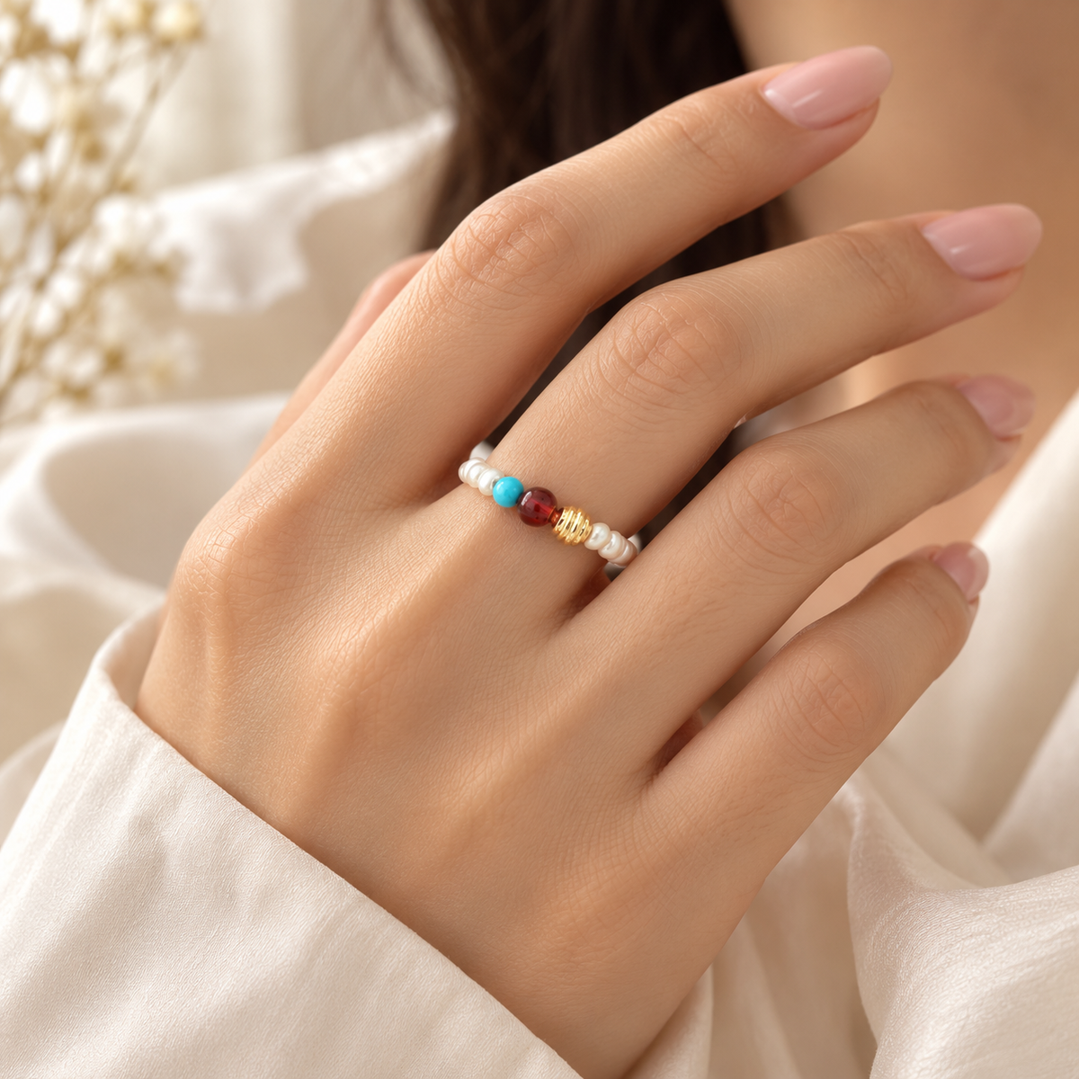 Color Pop Pearl Ring worn on ring finger
