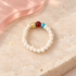 Color Pop Pearl Ring on ivory stone with red and turquoise accent