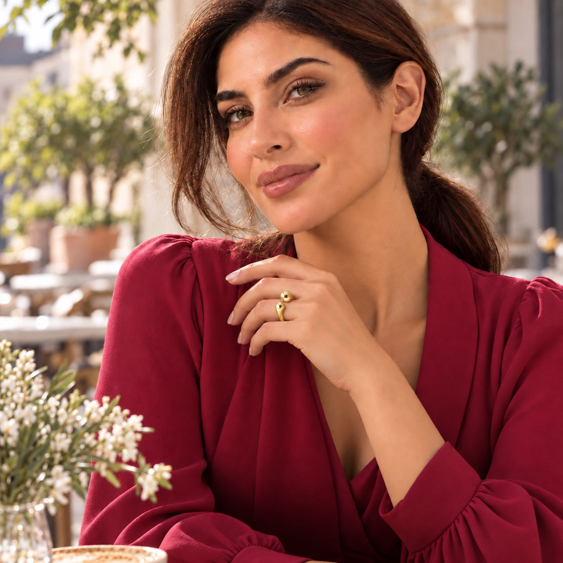 Bloomy model wearing the Solea sculpted open gold ring in natural light