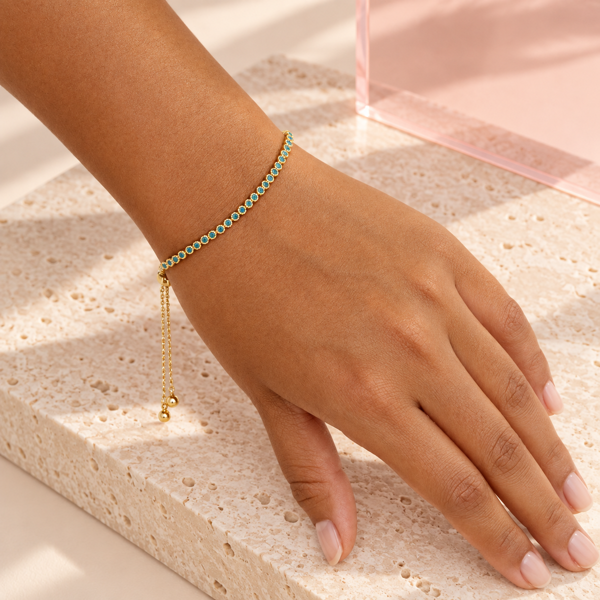 Bloomy model wearing Turquoise Allure gold bracelet