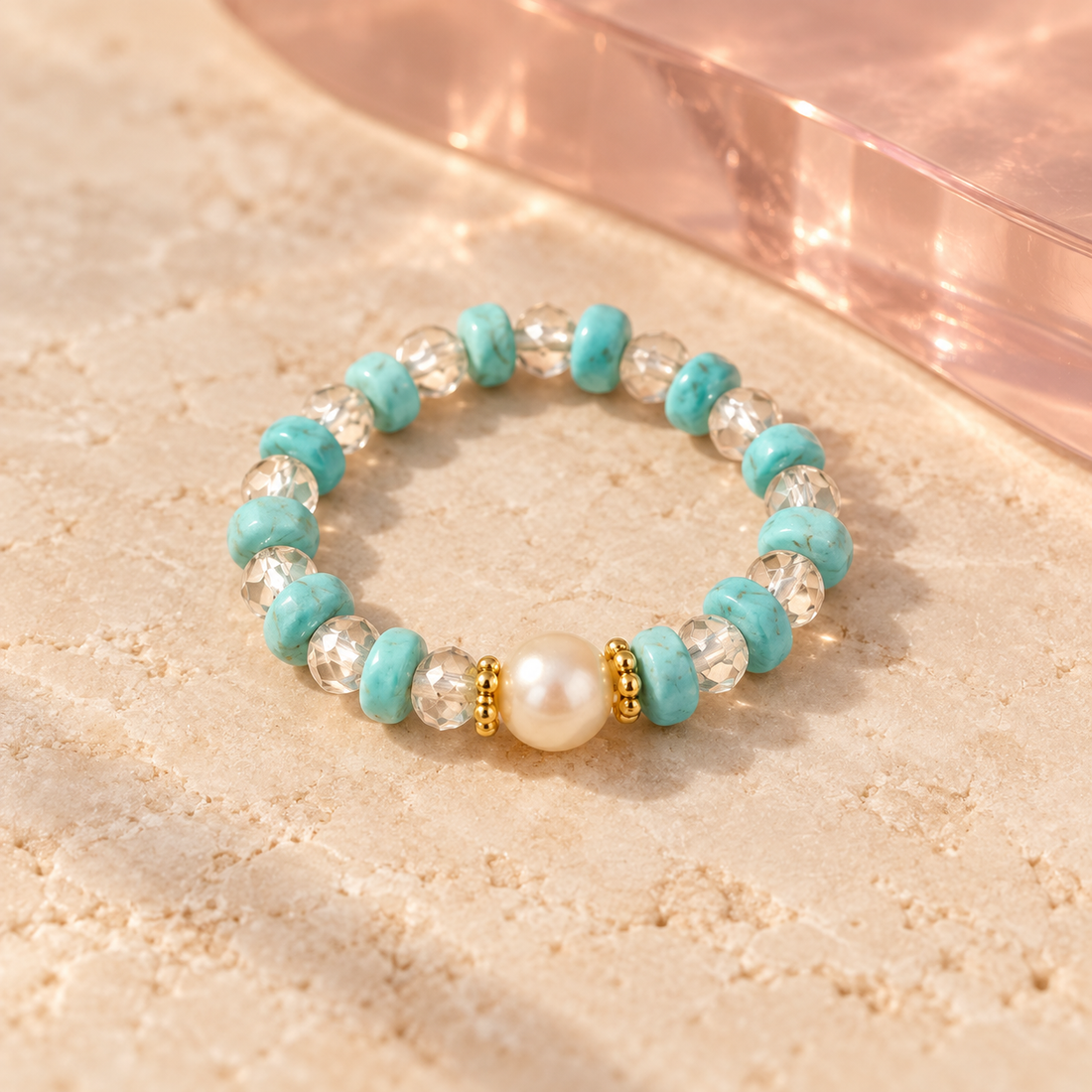 Turquoise pearl and clear bead ring on ivory stone
