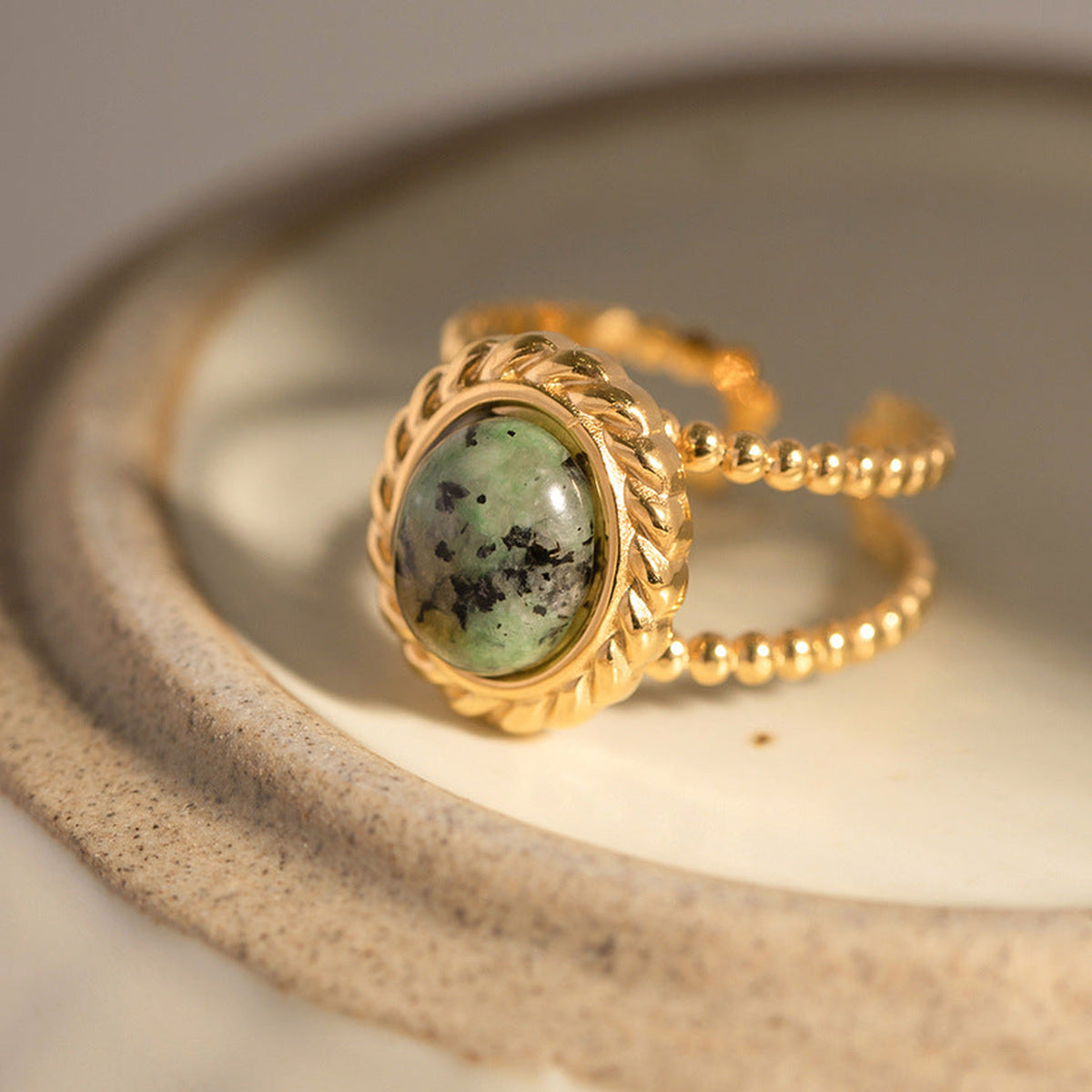 Twisted Double Band Ring with Natural Green Stone — detail view