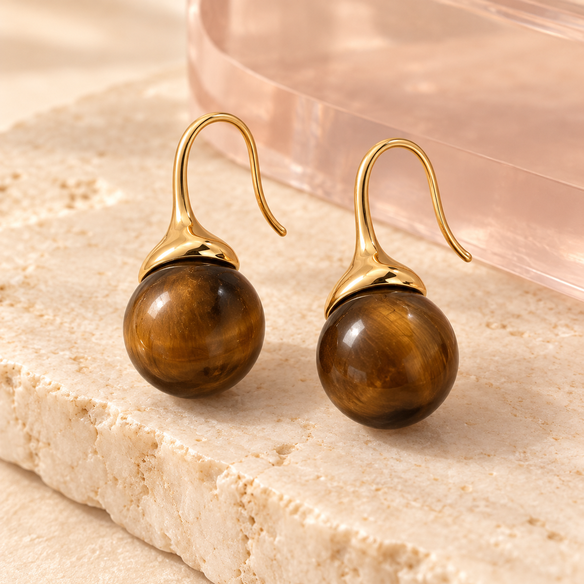 Pair of Bloomy golden brown bead drop earrings on ivory stone
