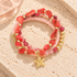Coral Sunset Starfish Bracelet by Bloomy