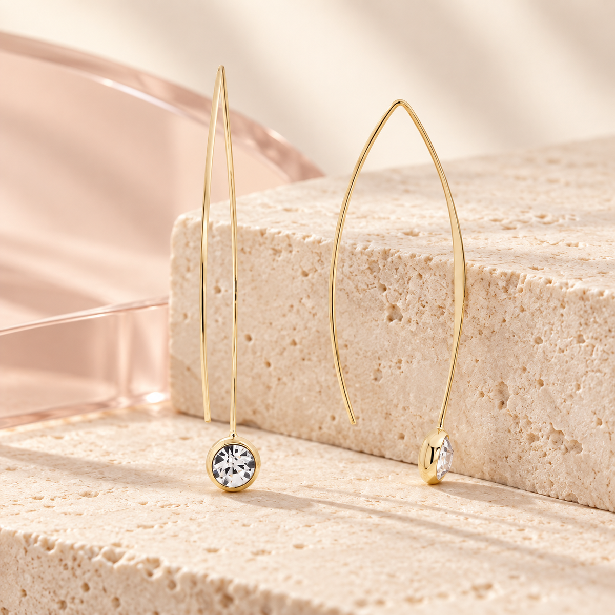 Bloomy Crystal Whisper Threader Earrings on a cream travertine display
