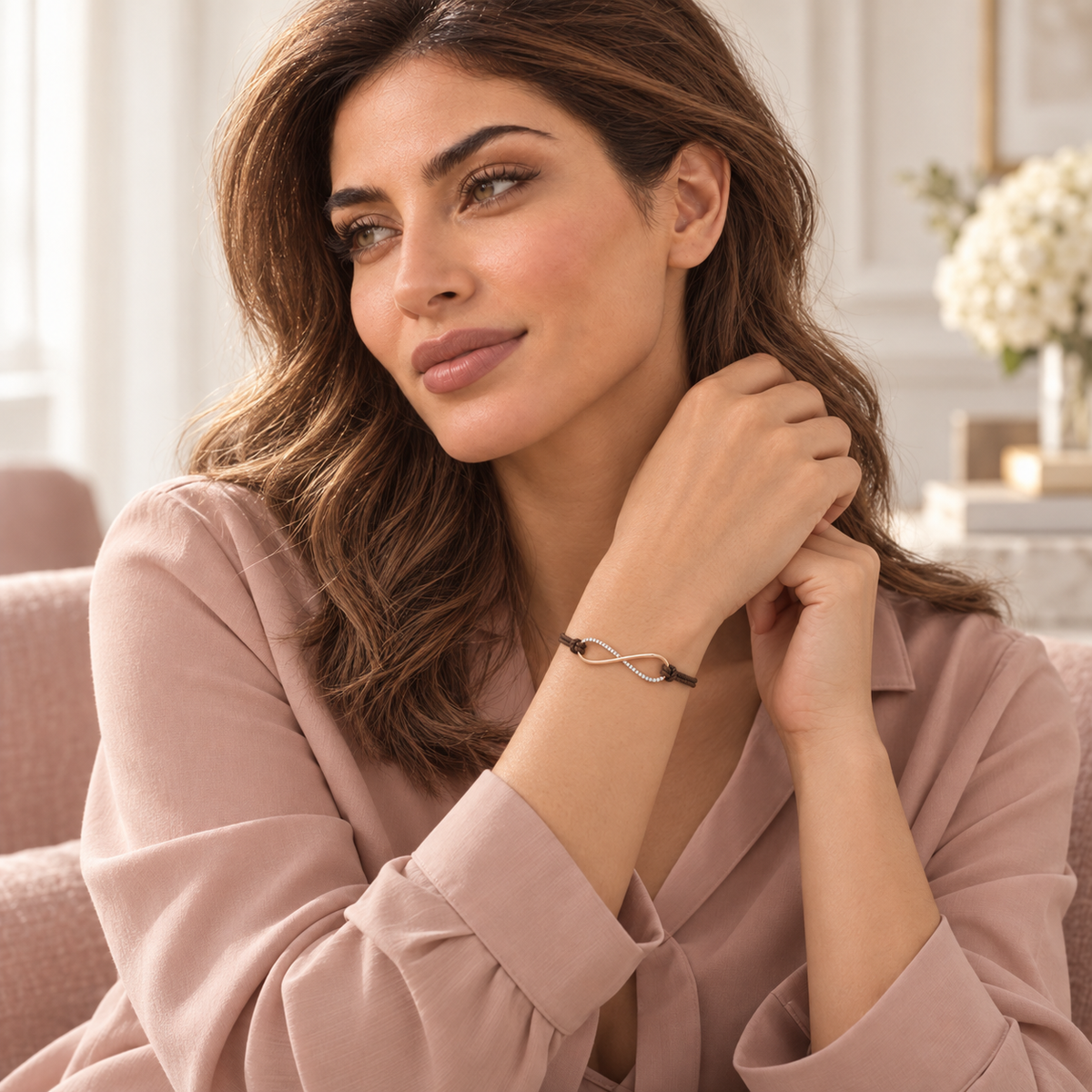 Close lifestyle view of the Eterna Rose infinity bracelet