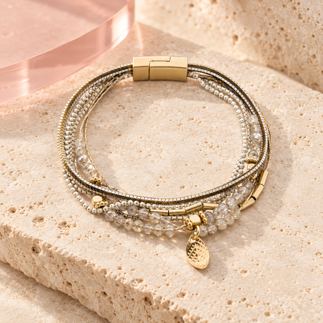 Lagoon Bracelet with crystal beads and gold-tone details on ivory travertine
