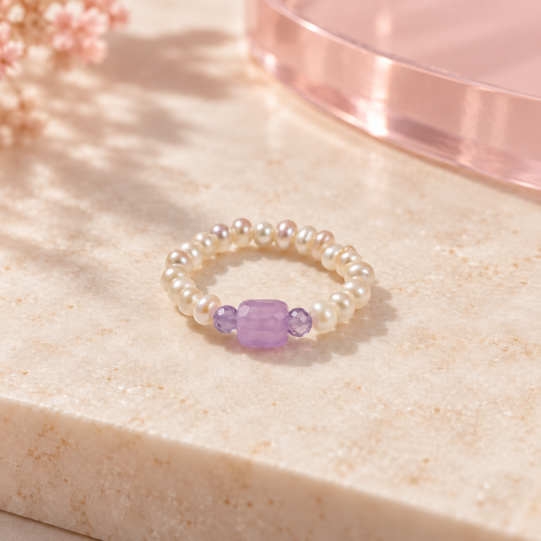 Lavender Pearl Trio Ring by Bloomy on warm ivory stone