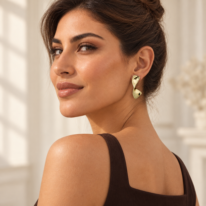 Bloomy model wearing Luna Twist Earrings in a second styling