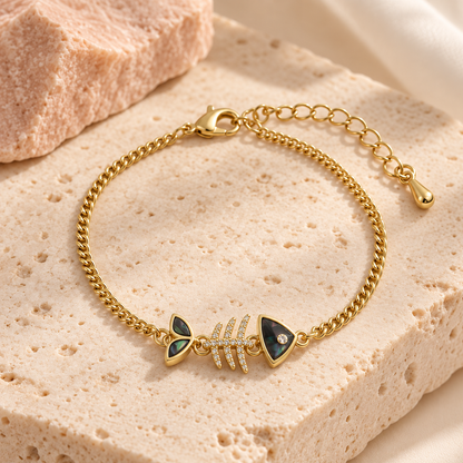 Bloomy Midnight Marina Fishbone Bracelet on cream travertine