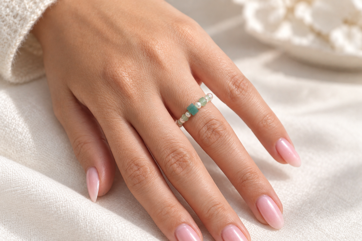 Seafoam Pearl Ring by Bloomy worn on an elegant hand